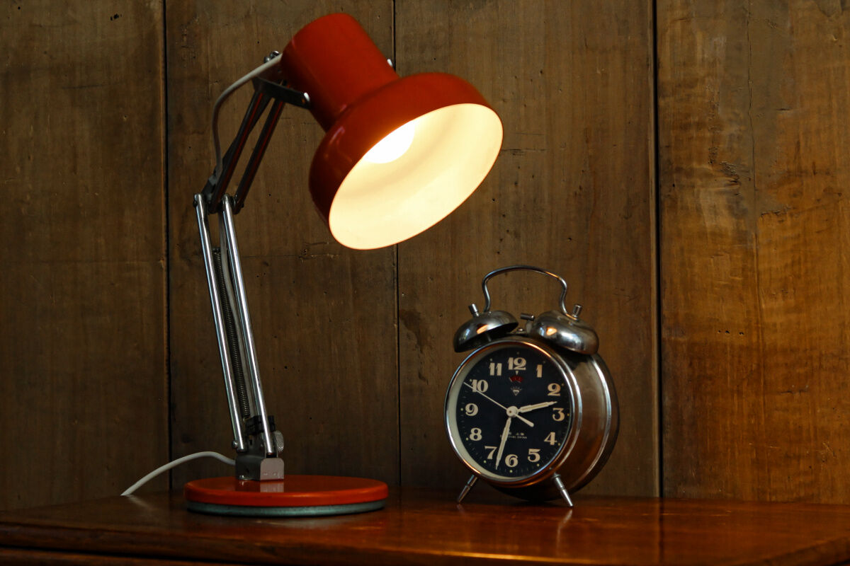 Orange articulated vintage desk lamp