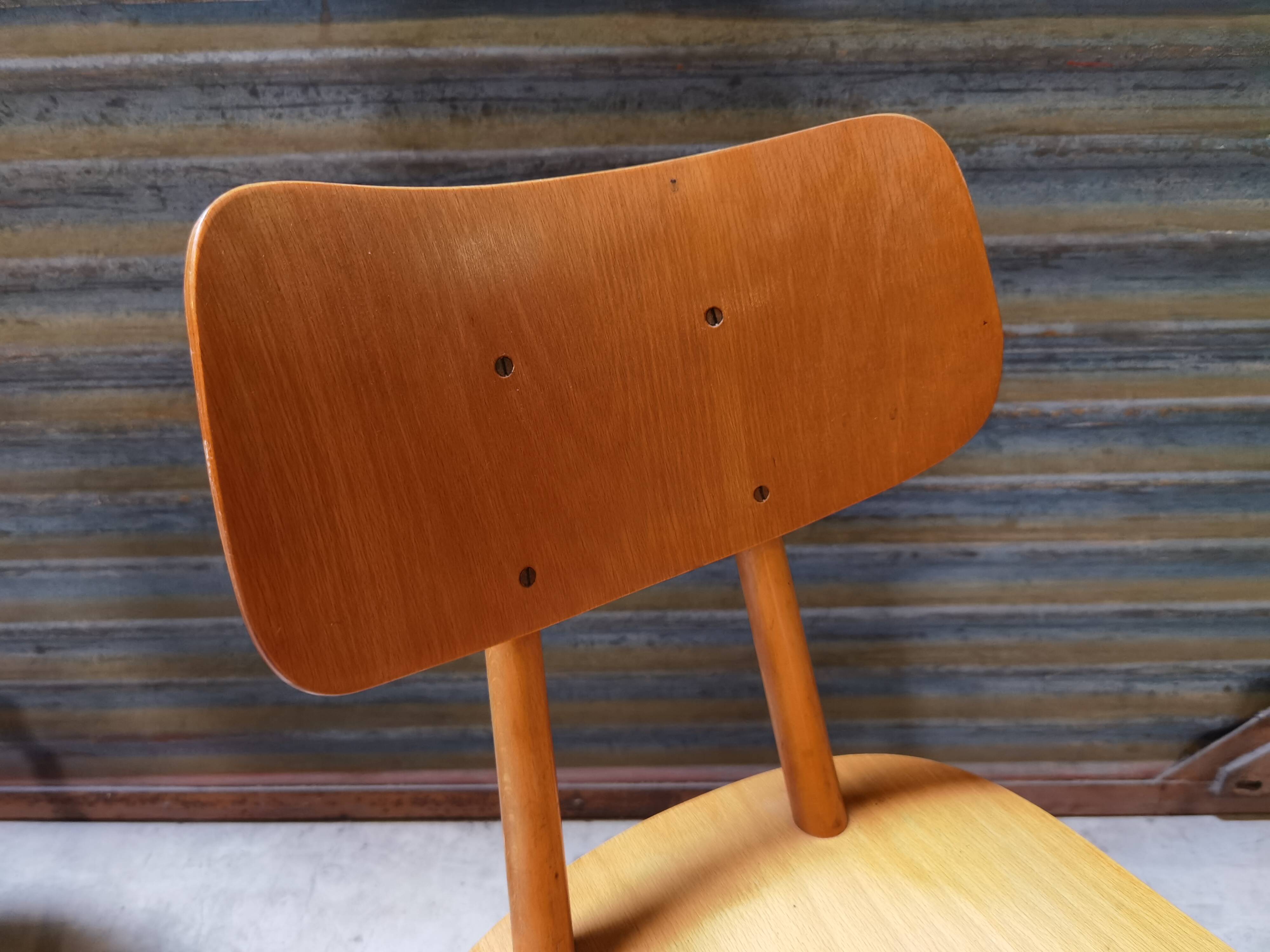 Wooden tower chair published by Ton 1960