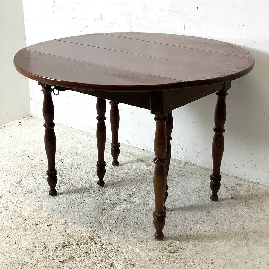 Table en acajou extensible 4 rallonges fournies