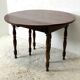 Table en acajou extensible 4 rallonges fournies