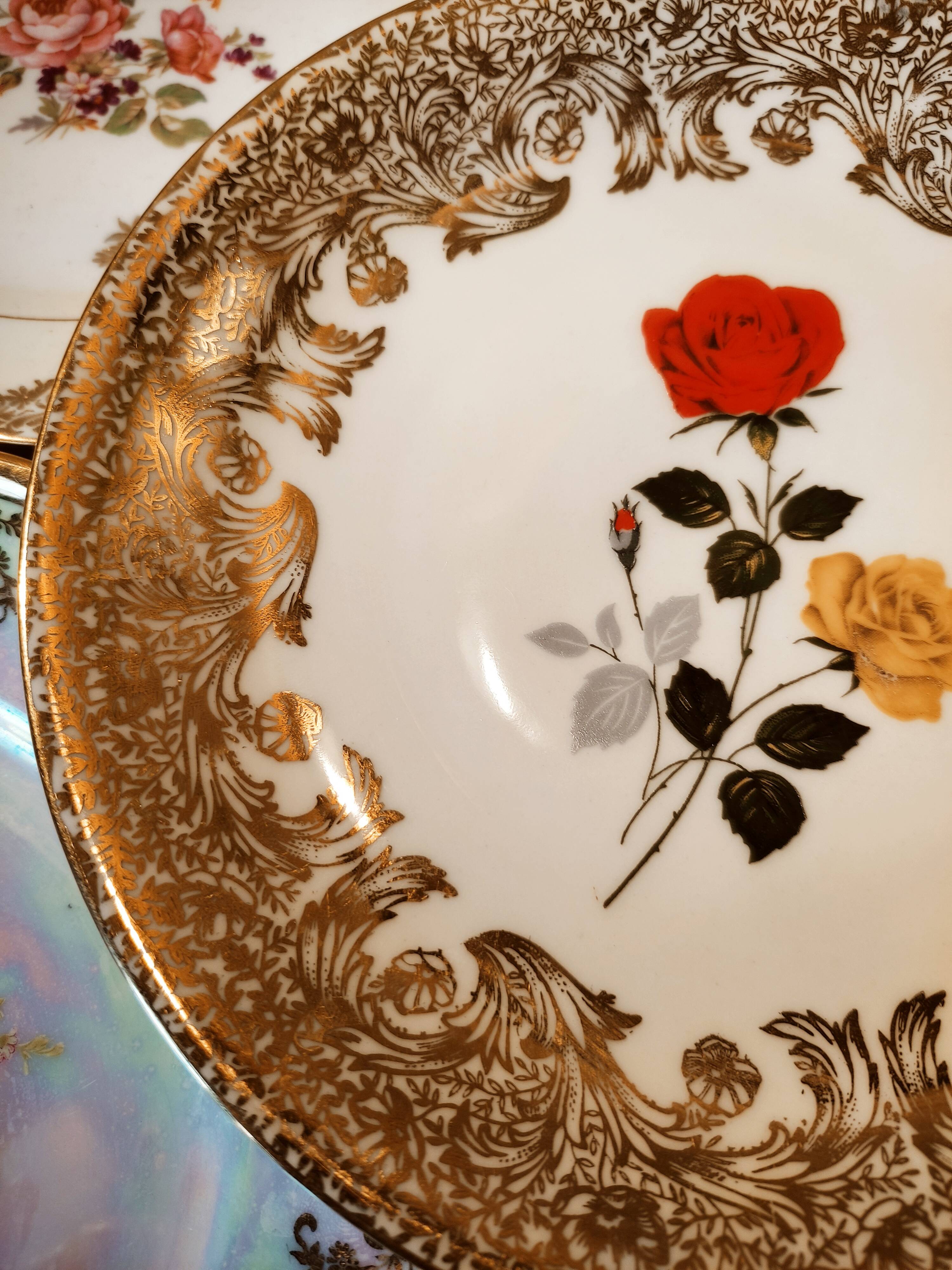 6 mismatched dessert plates decorated with roses