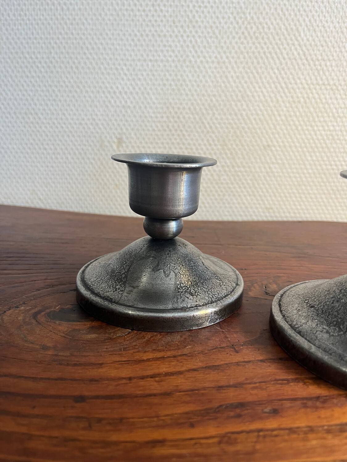 2 Charles Piguet wrought iron candlesticks