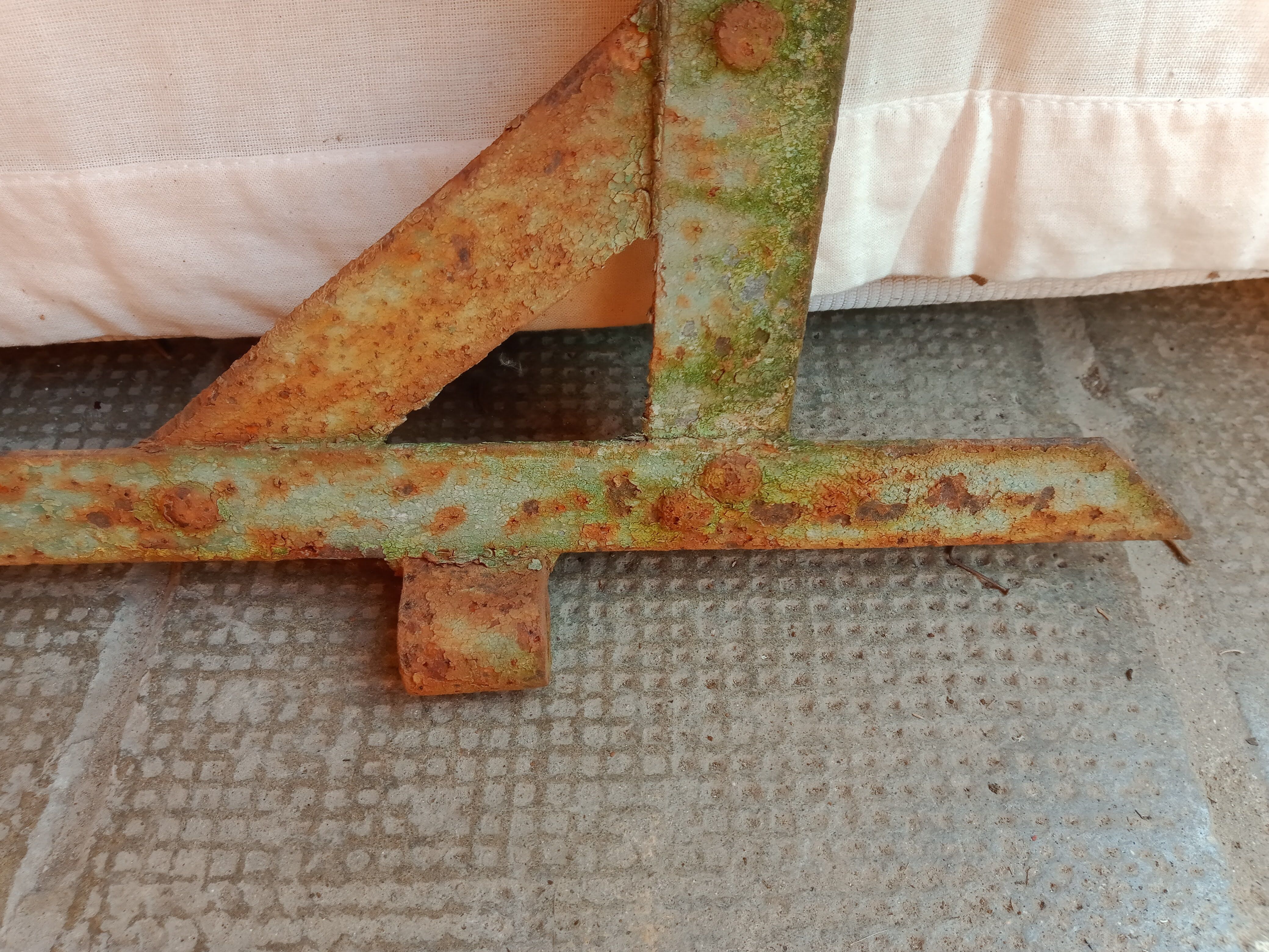 Old riveted metal gate