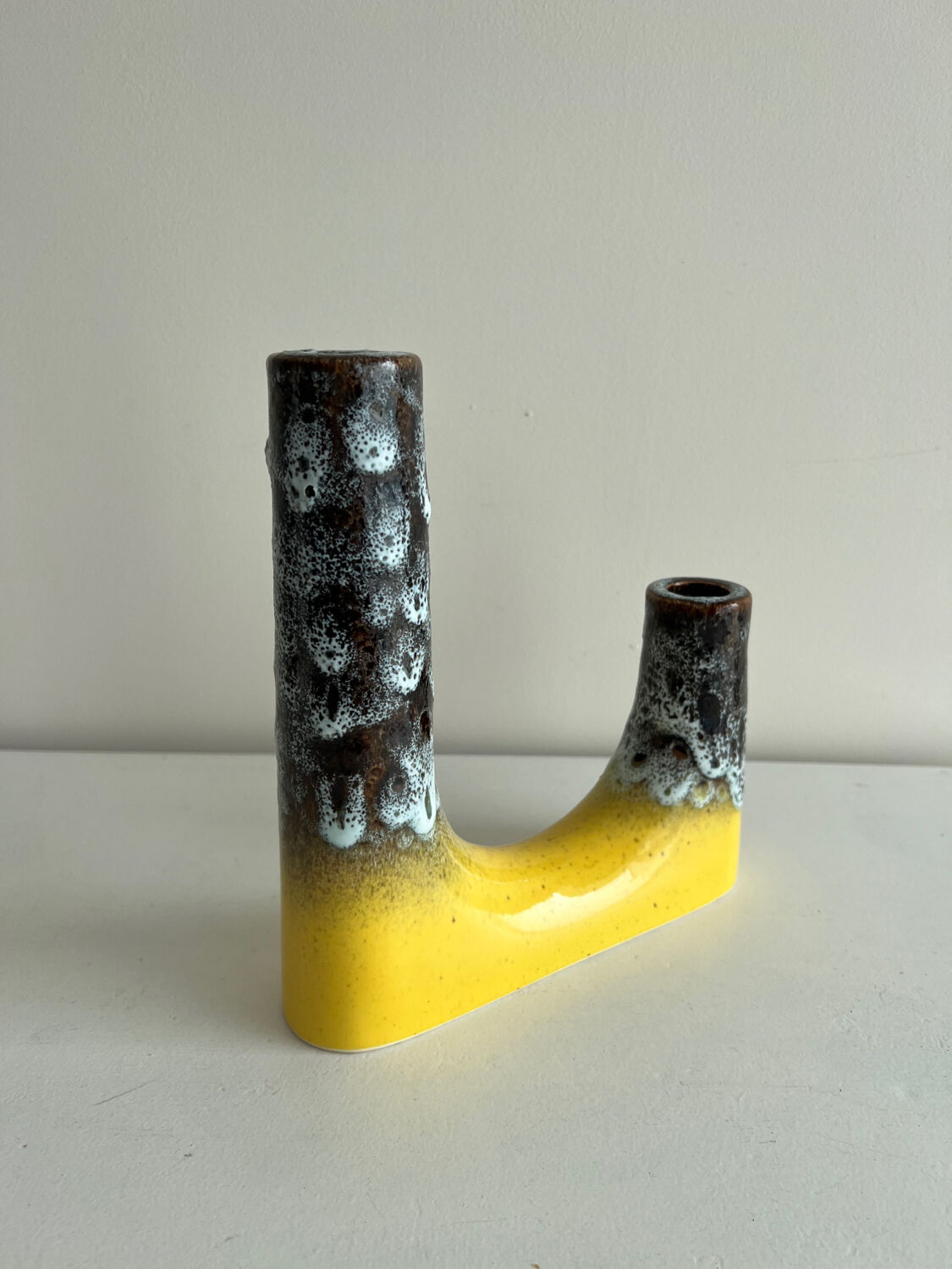 Double asymmetrical candle holder