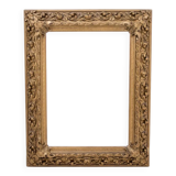 Antique mirror in richly decorated frame, France.