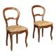 Pair of antique Louis-Philippe chairs in walnut and fabric, Italy, 19th century.