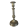 Large antique brass candlestick with floral decoration.