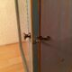 Display shelf with miniature blue wood and mirrors