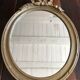 Miroir ovale style Louis XVI