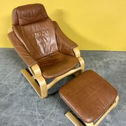 Danish vintage cognac leather armchair and footstool by Skipper Mobler