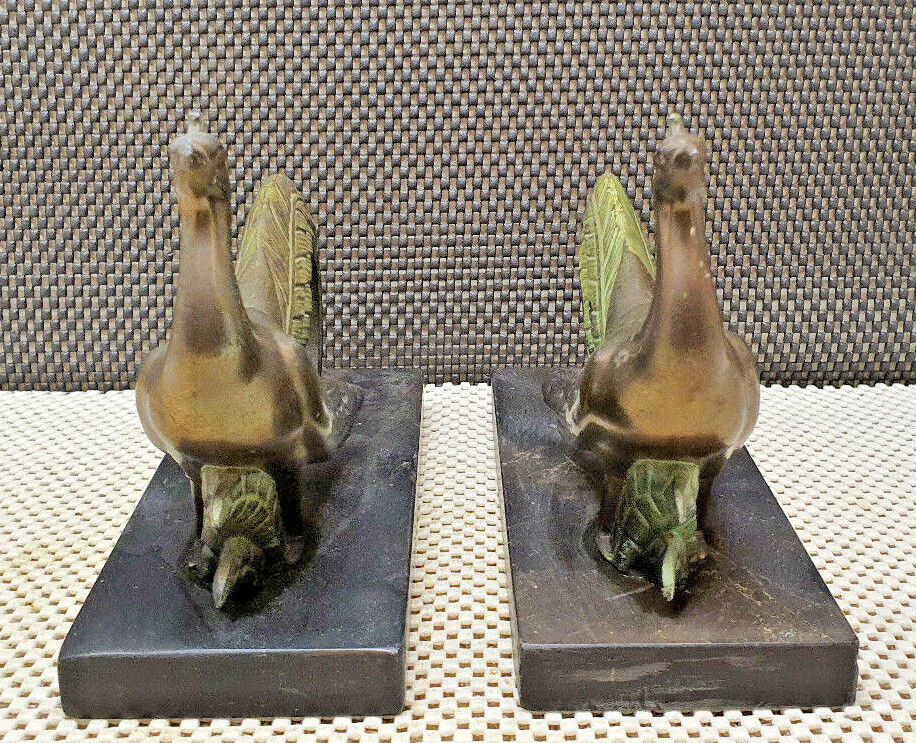 Pair of regulated and marble greenhouse books