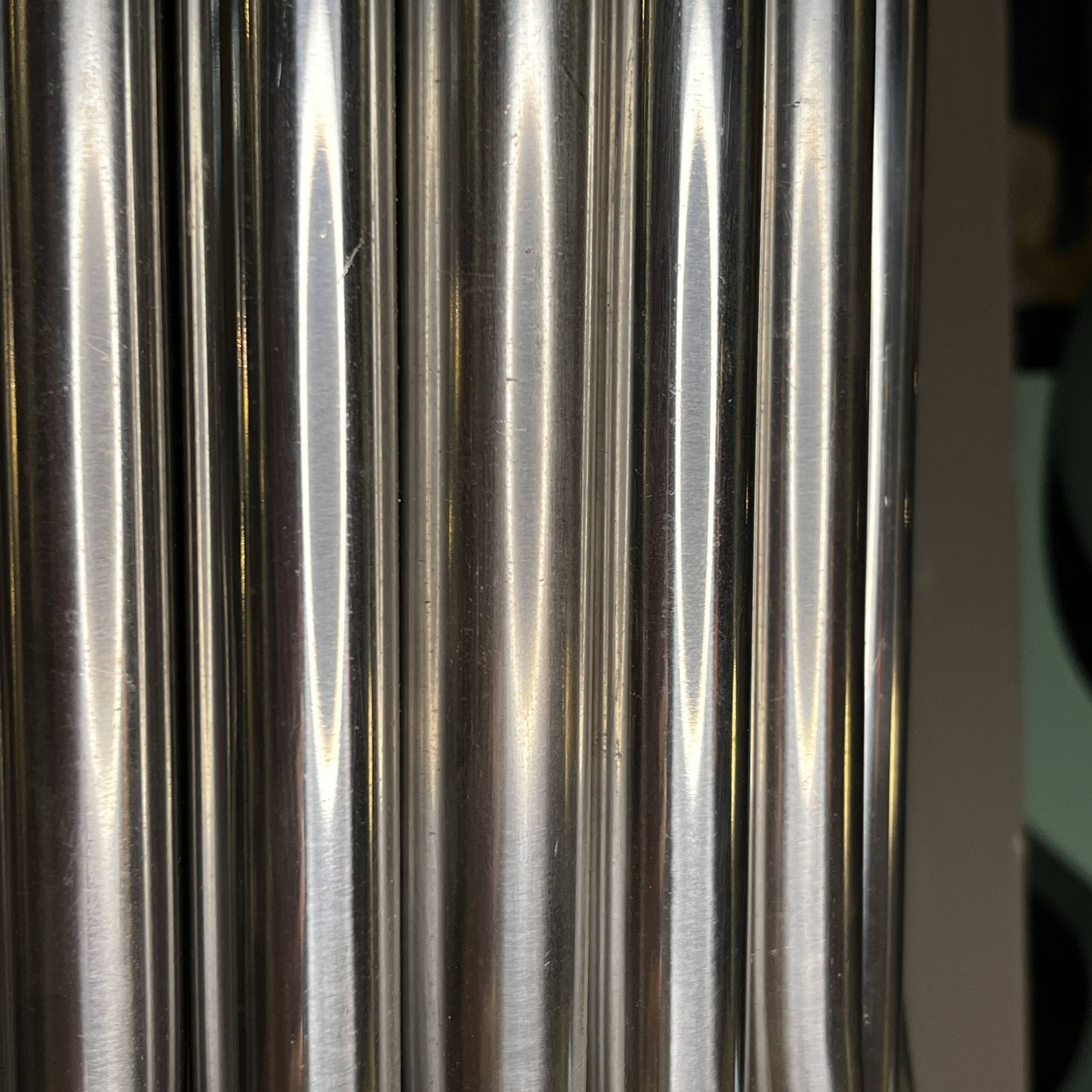 Raak 'concorde' pair of wall lights, 'organ tube' type in brushed aluminium, ca 1970