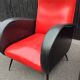 Paire de fauteuils en skaï rouge et noir