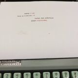 Hermès Baby lime green typewriter with suitcase