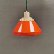 An orange pendant lamp made from hard-pressed ABS plastic. Denmark 1970s