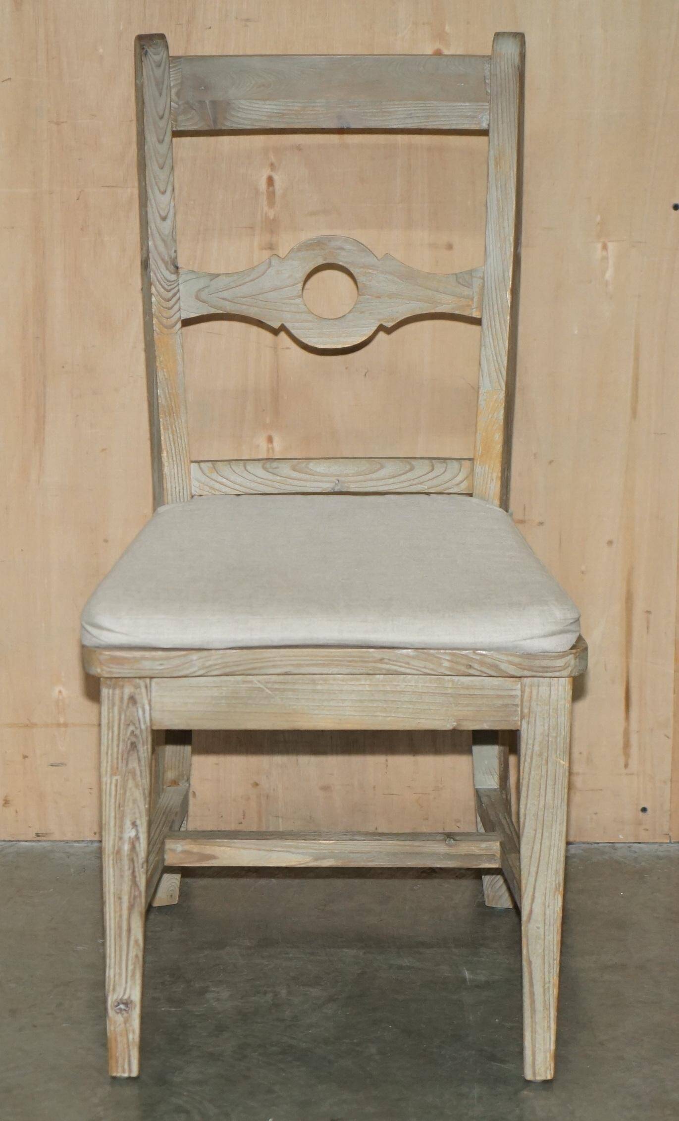 Pair of Swedish-style accent chairs in recycled pine with upholstered seats.