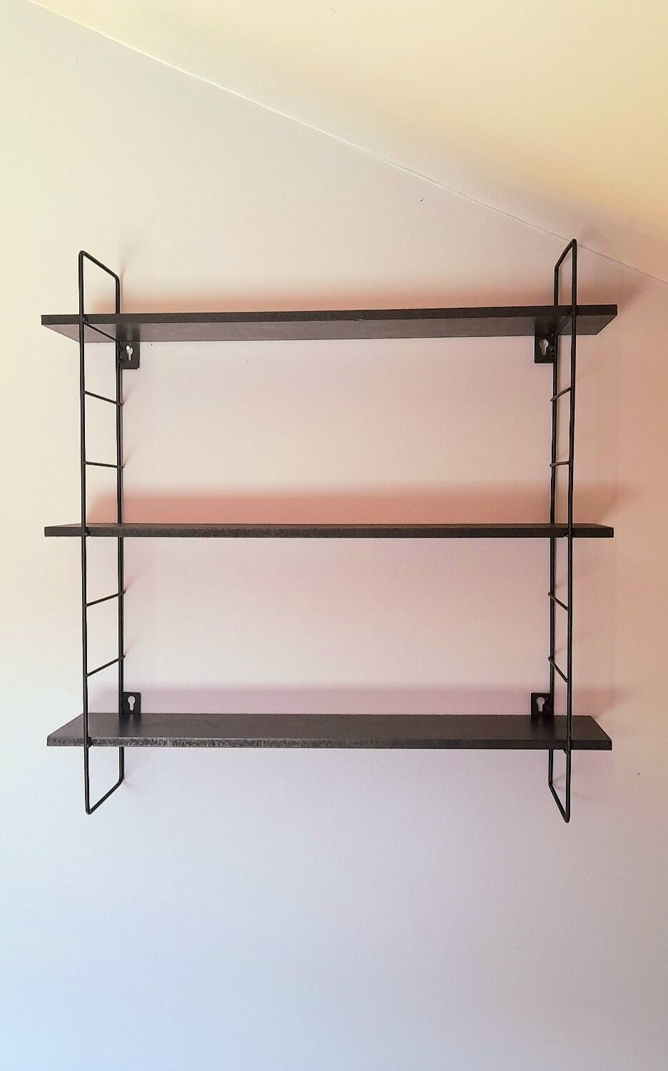 String style wall shelf