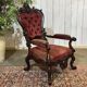 Fauteuil en acajou 19ème richement sculpté de style baroque