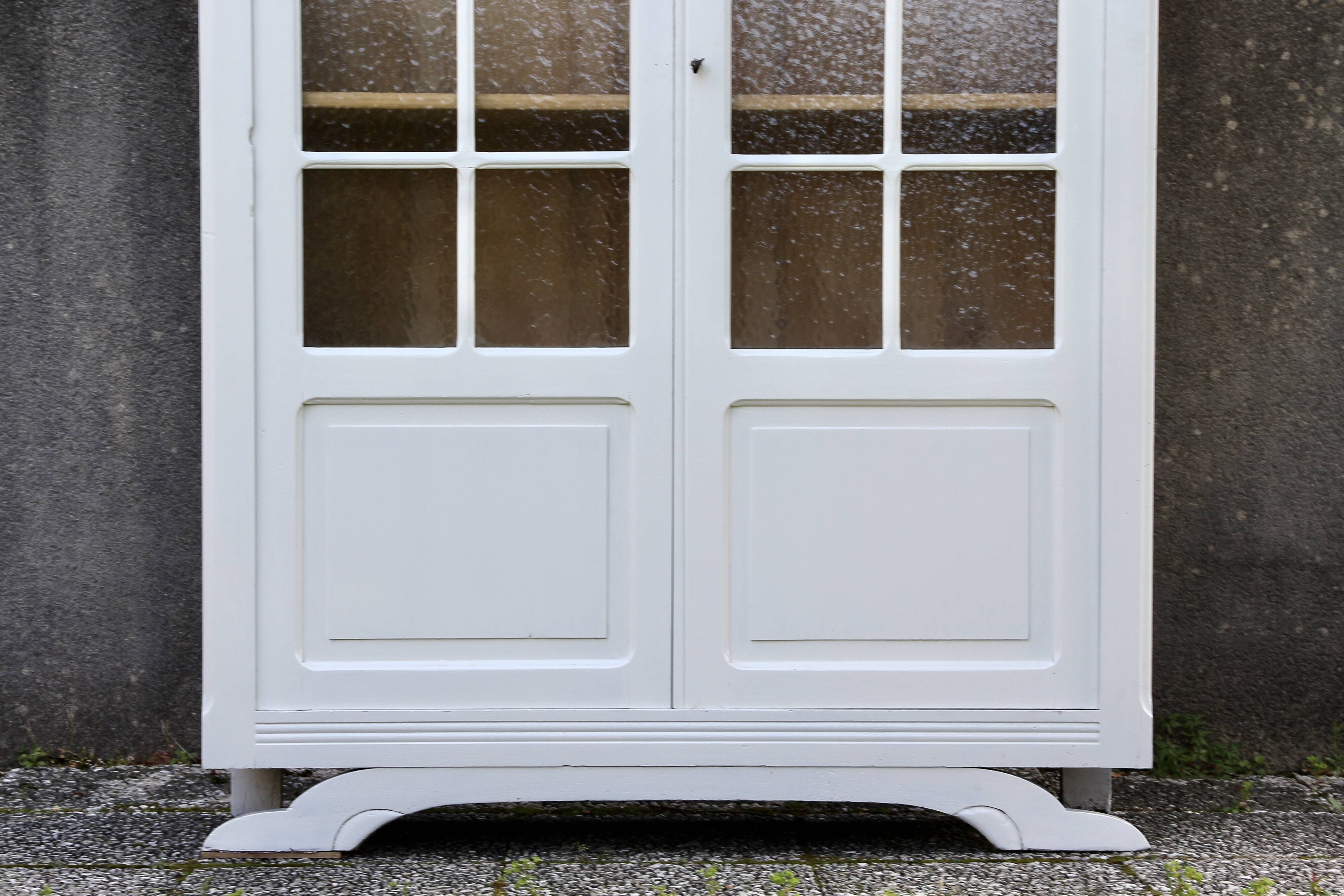 Vintage glass-fronted Parisian wardrobe