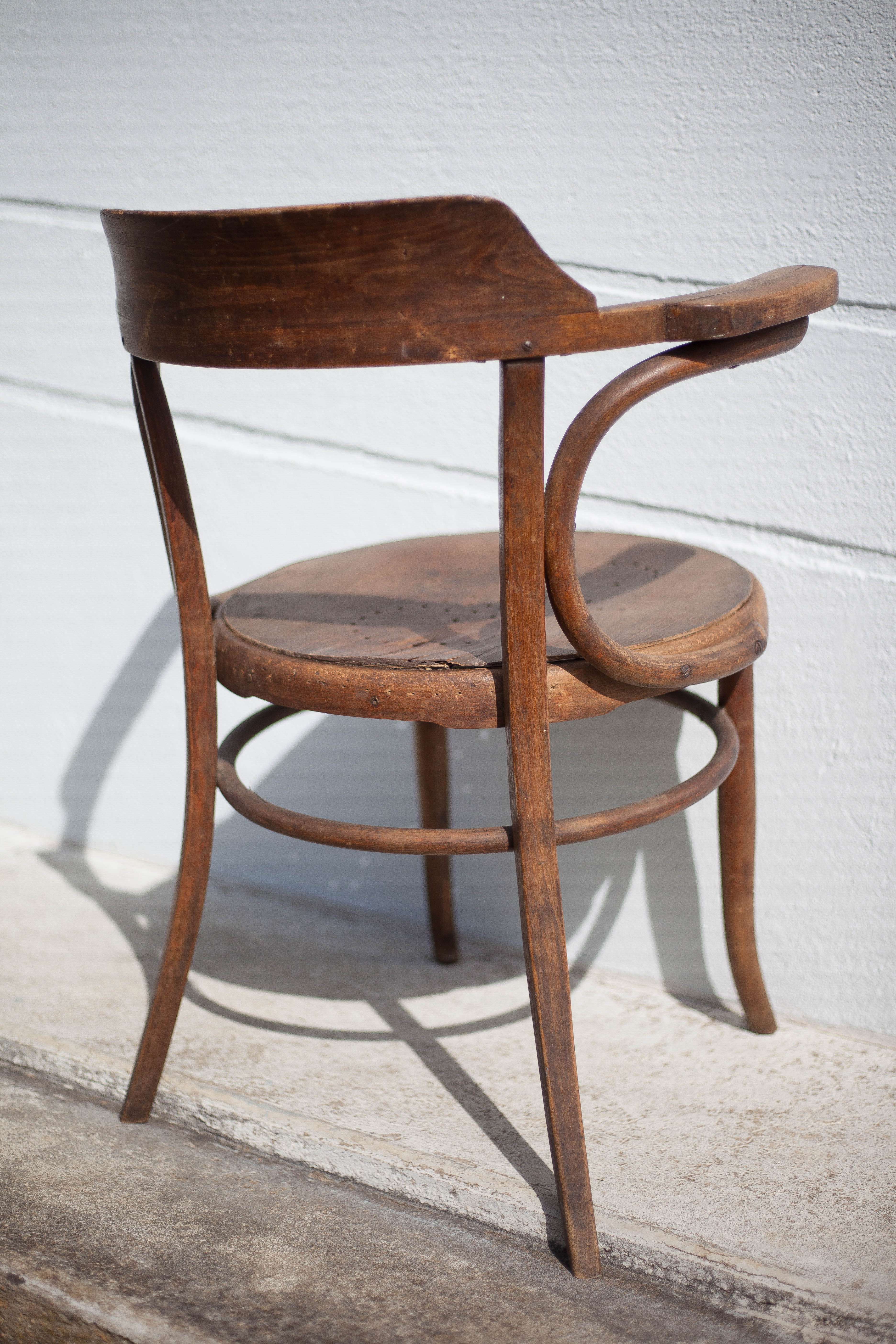 Curved wooden armchair Mundus vienna Austria, curved wooden chair, living room, bookcase, 20's