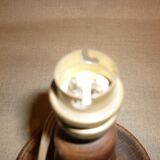 Turned wooden lamp base.