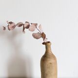 Bottle made of ancient sandstone