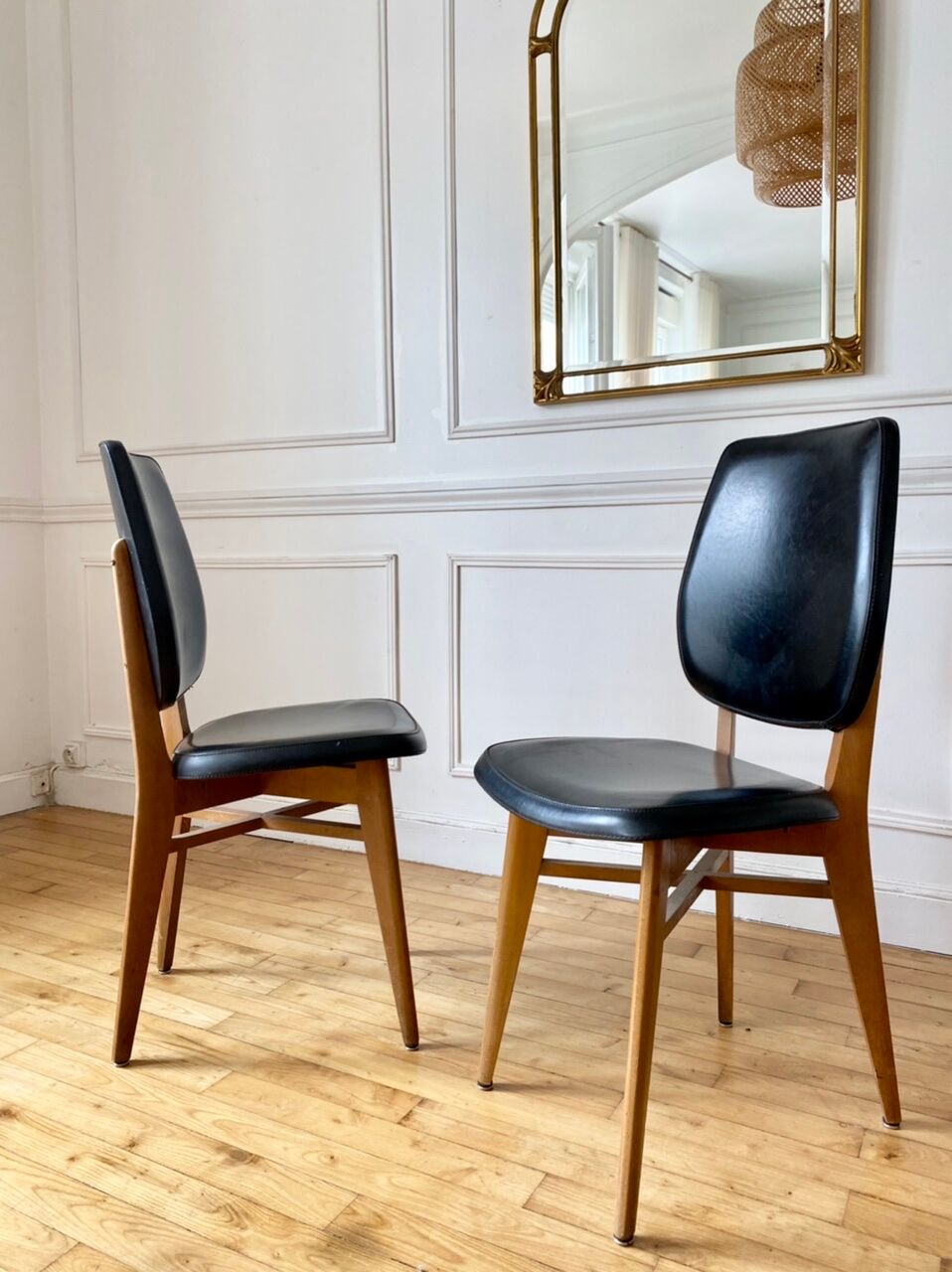 Pair of vintage wood and leather chairs