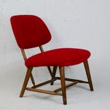 Chauffeuse by Alf Svensson, Model TeVe, published by Ljungs Industrier, Sweden, 1953. Retyped red.