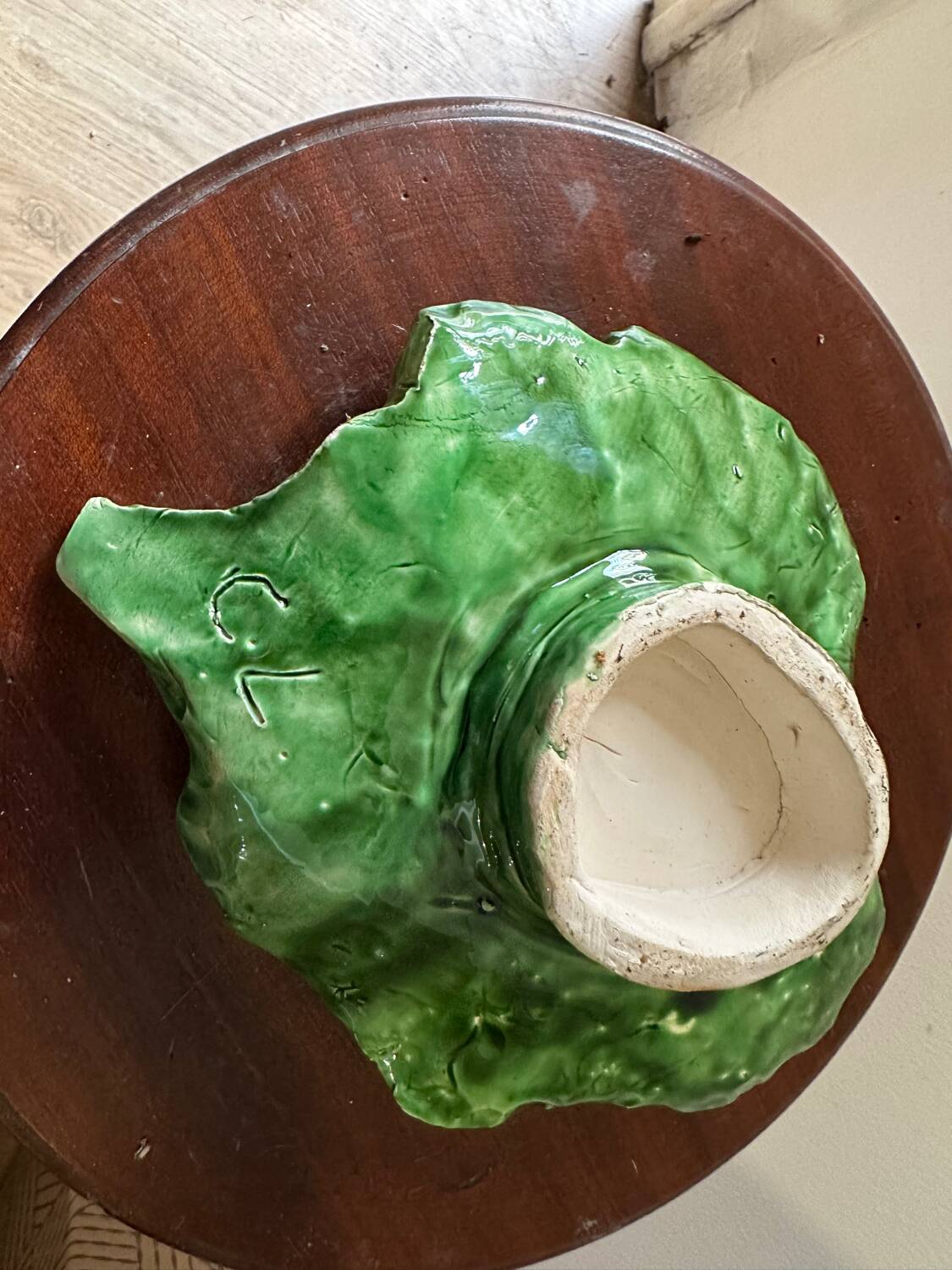 Vintage ceramic leaf-shaped vide poche, signed.