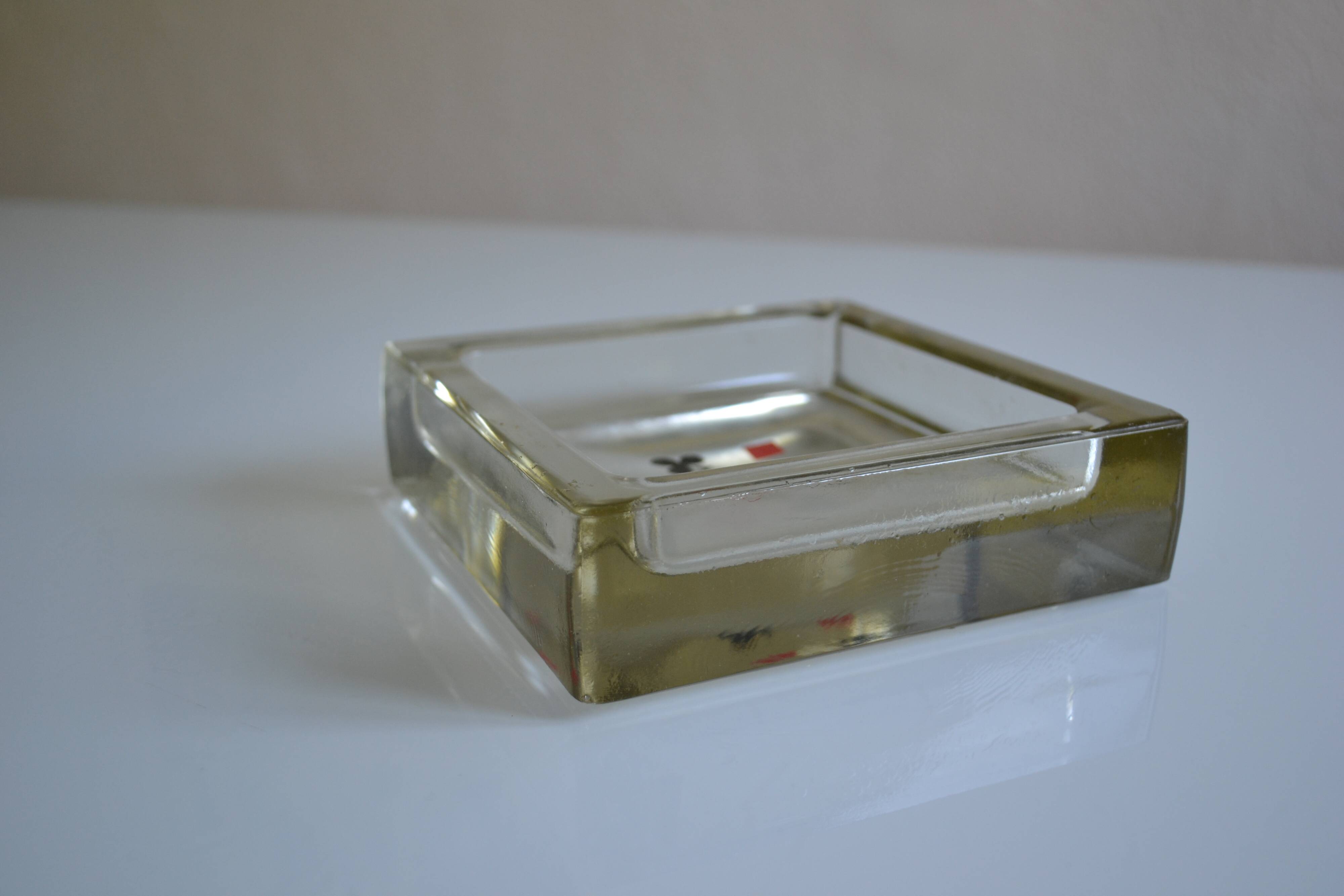 glass block pockets in the 4 colours of the card game