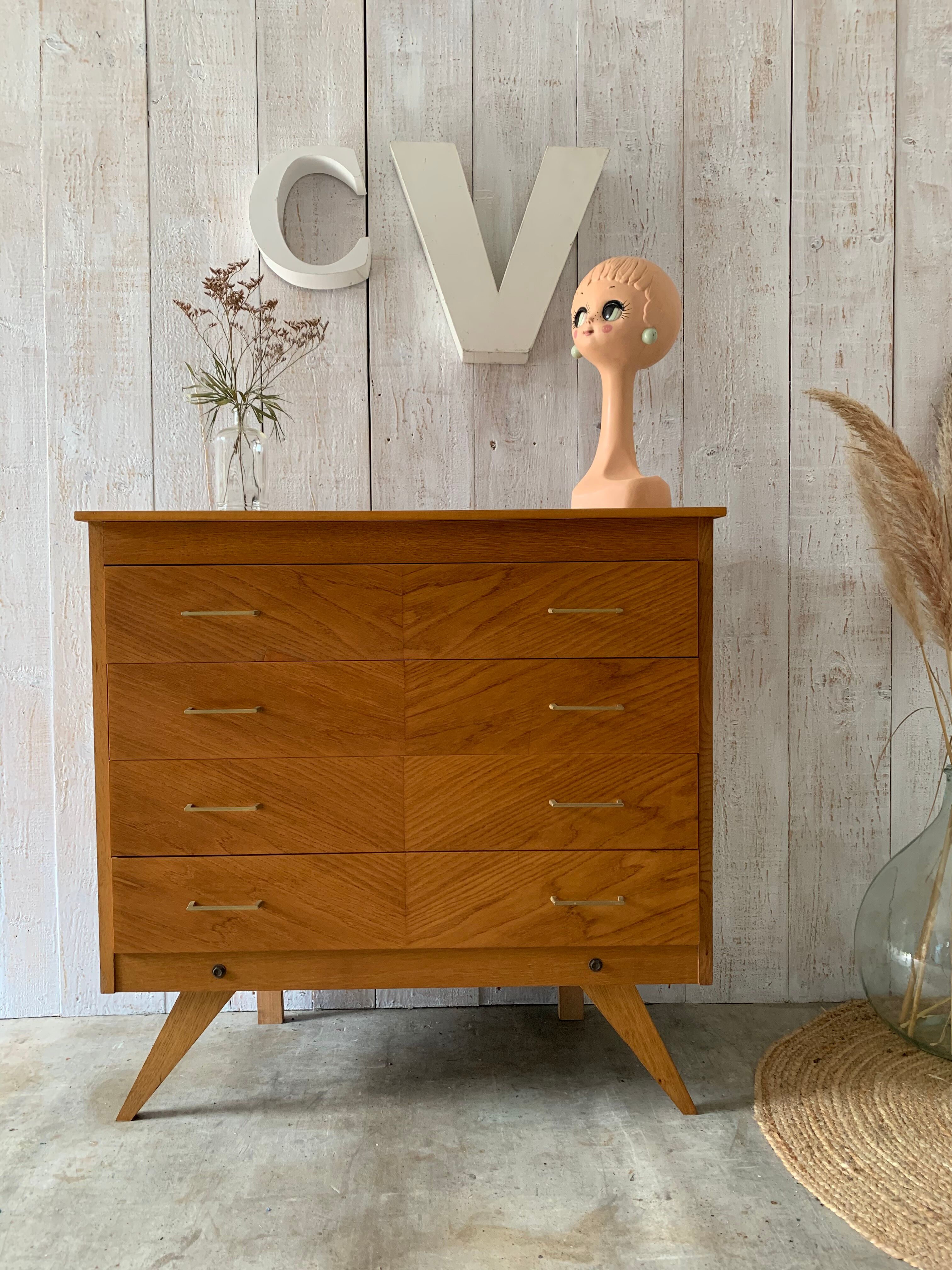 Chest of drawers with compass feet