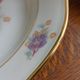 12 semi-hollow plates in Vierzon porcelain decorated with flowers and gilding