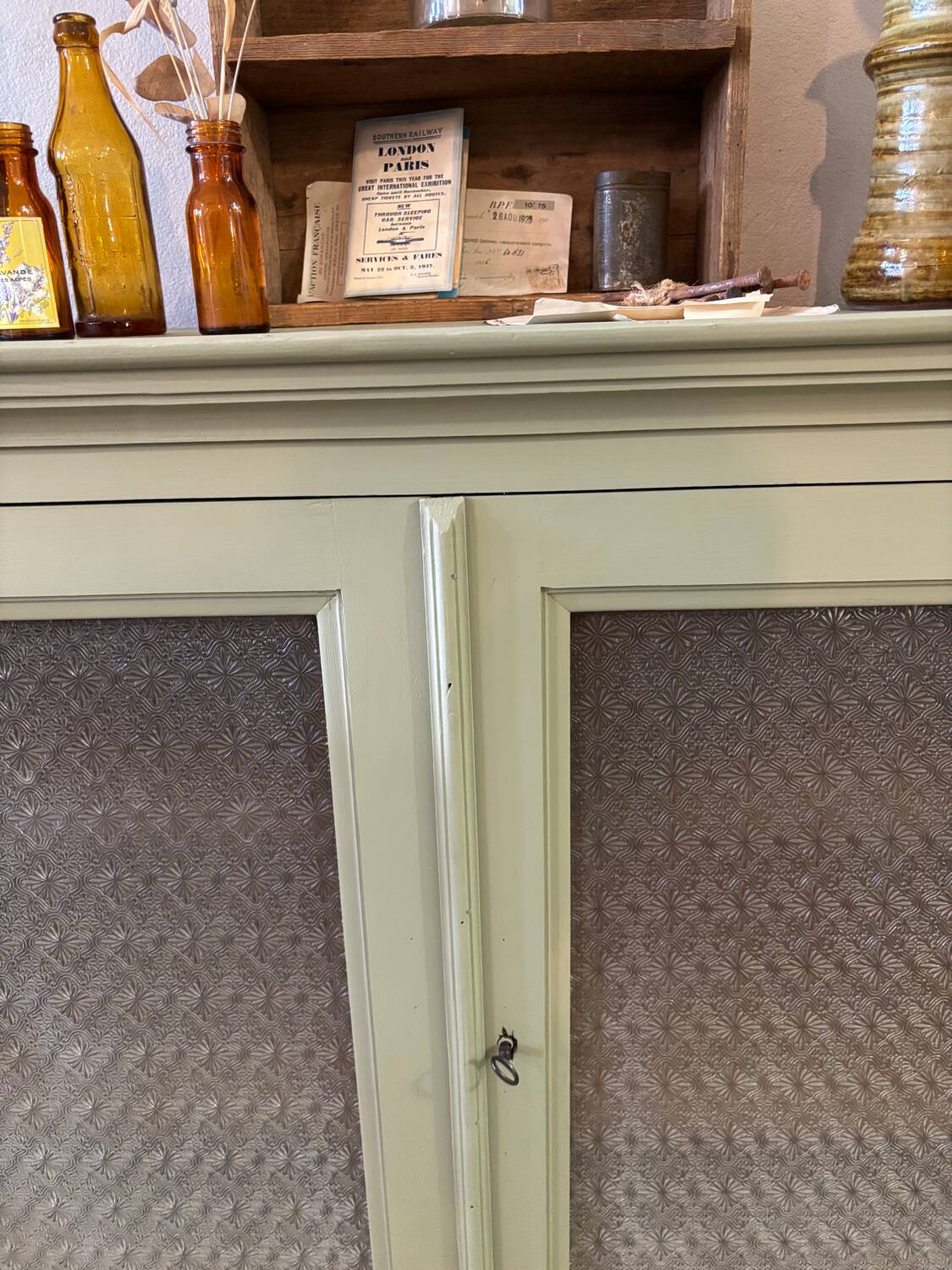 Khaki glass sideboard