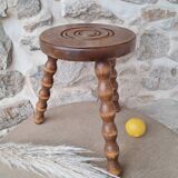 Wooden tripod stool with spool foot