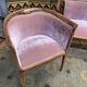 Living room with bench and two english armchairs in pink velvet