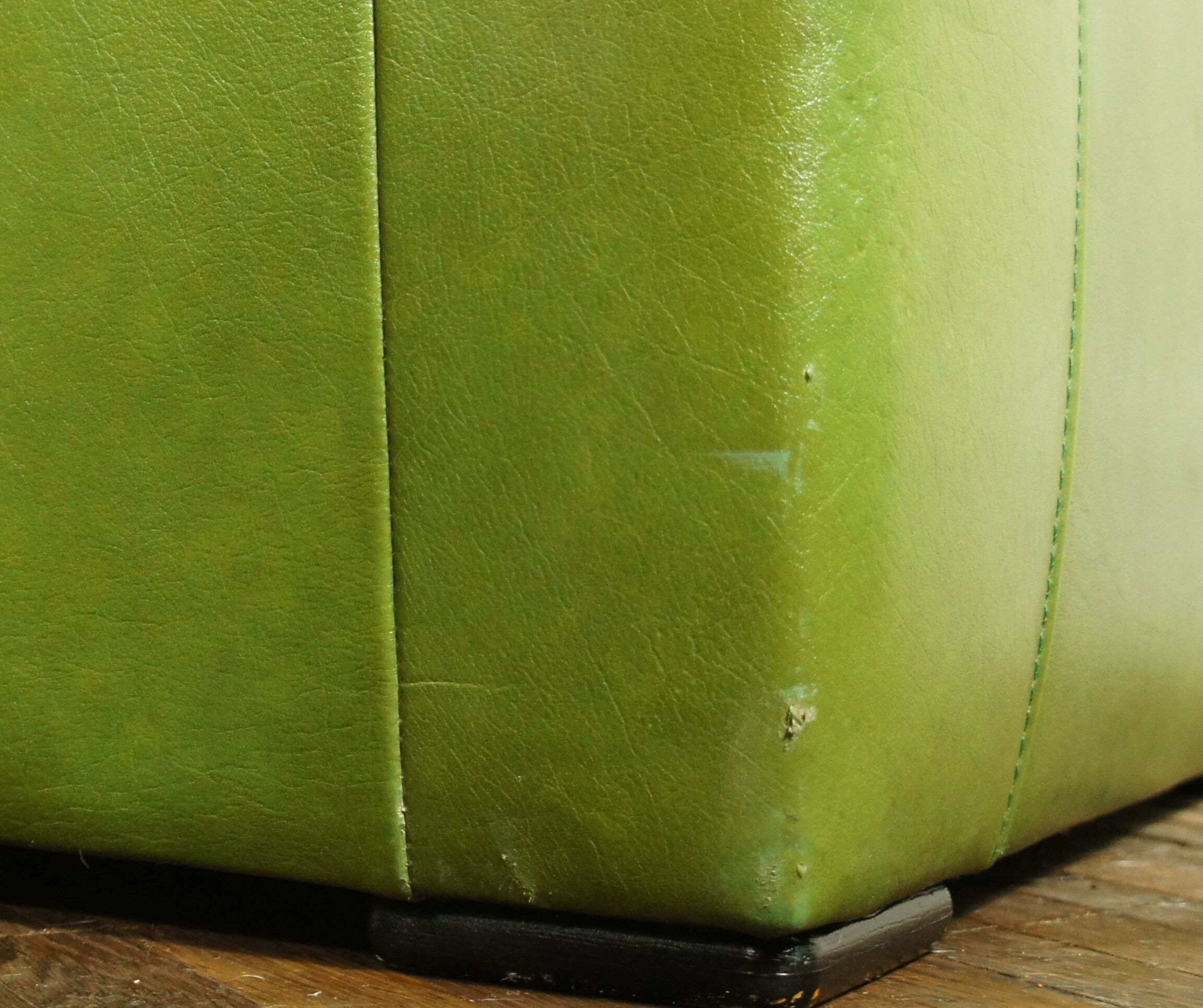 Fauteuil lounge en cuir vert