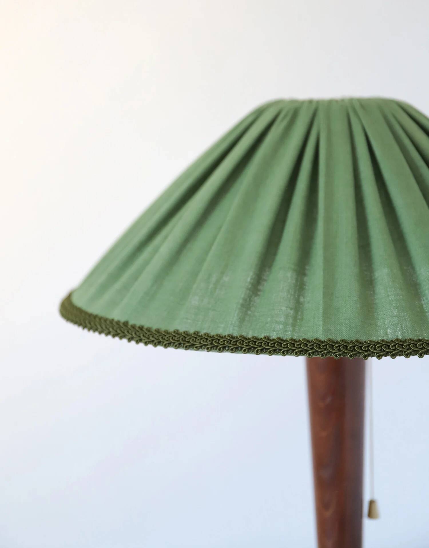Recycled vintage lamp — spindle wooden base, pleated green linen shade