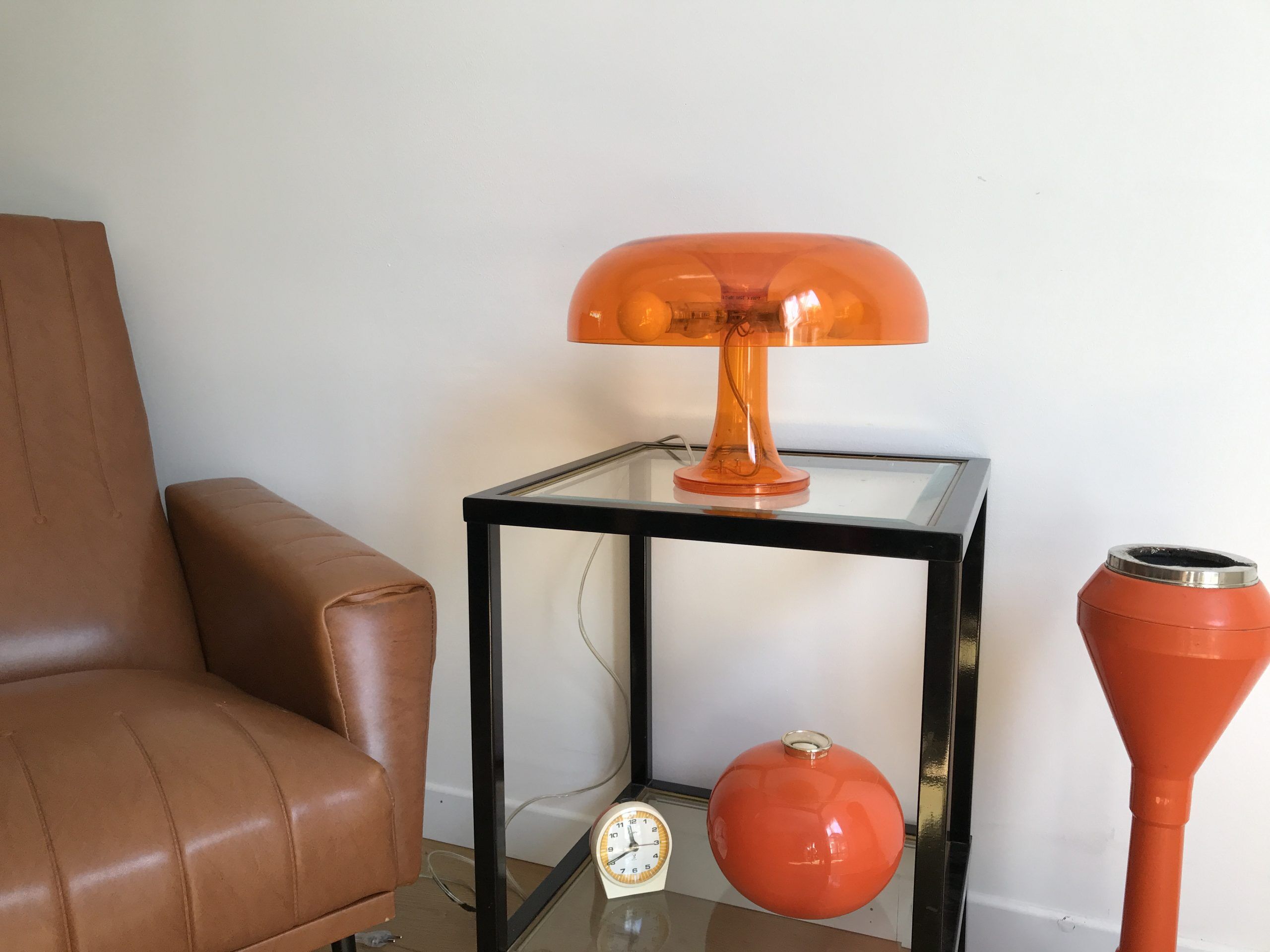 Orange nessino pose lamp for artemide by giancarlo mattioli