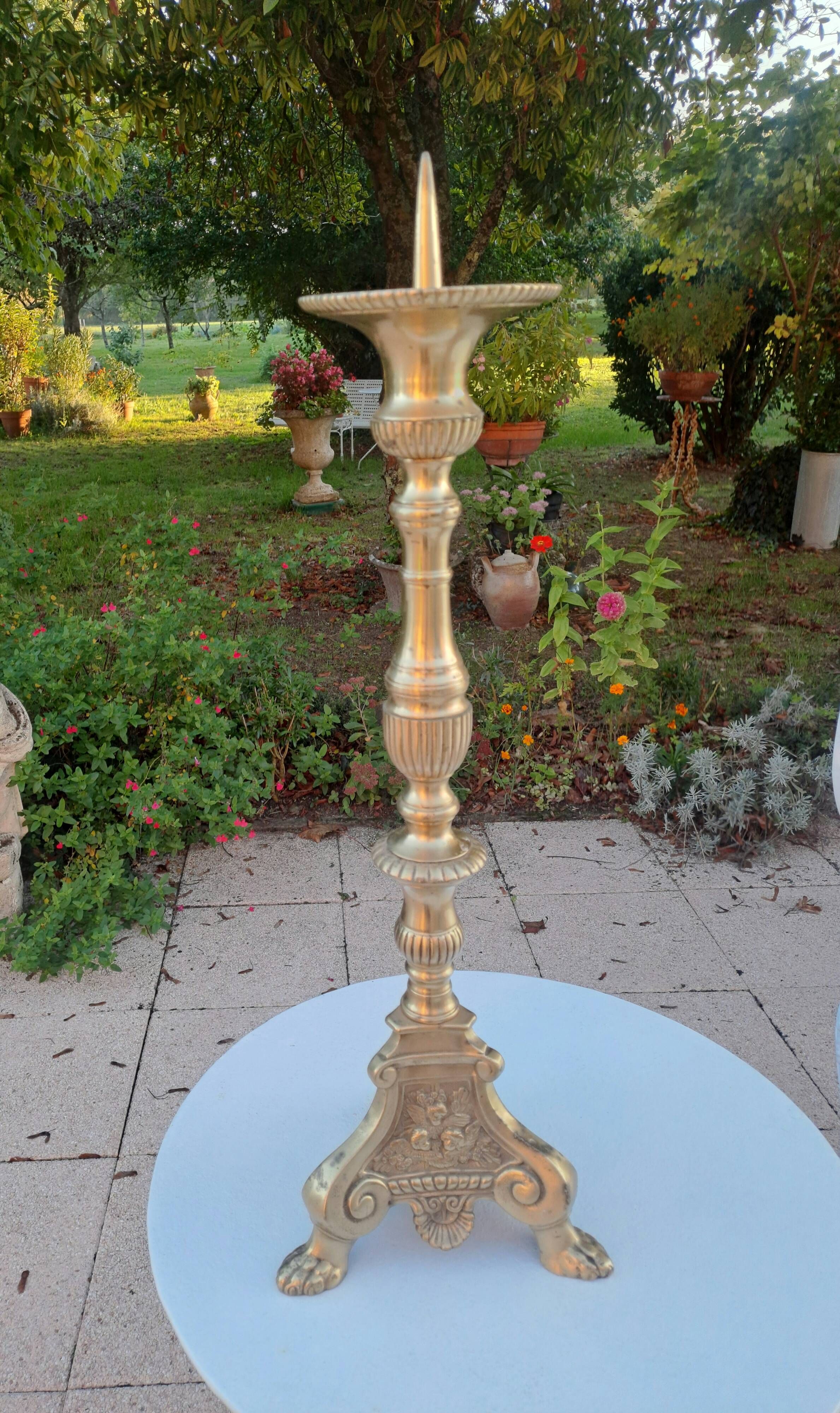 Large gilded bronze candlestick from the 19th century, height 67.5 cm.