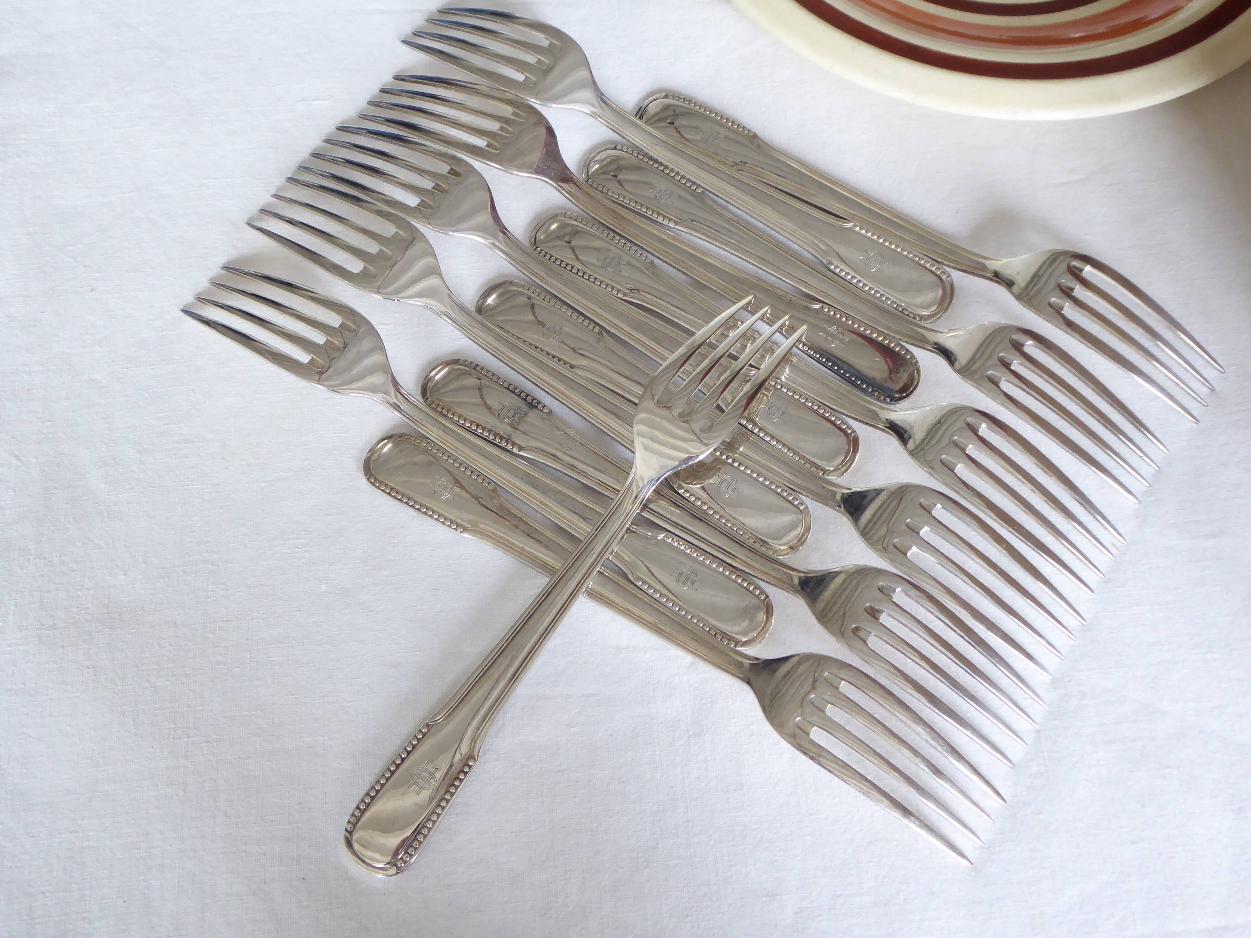 12 dessert forks, silver metal
