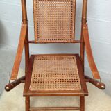 Bamboo folding armchair and caning, leather and brass