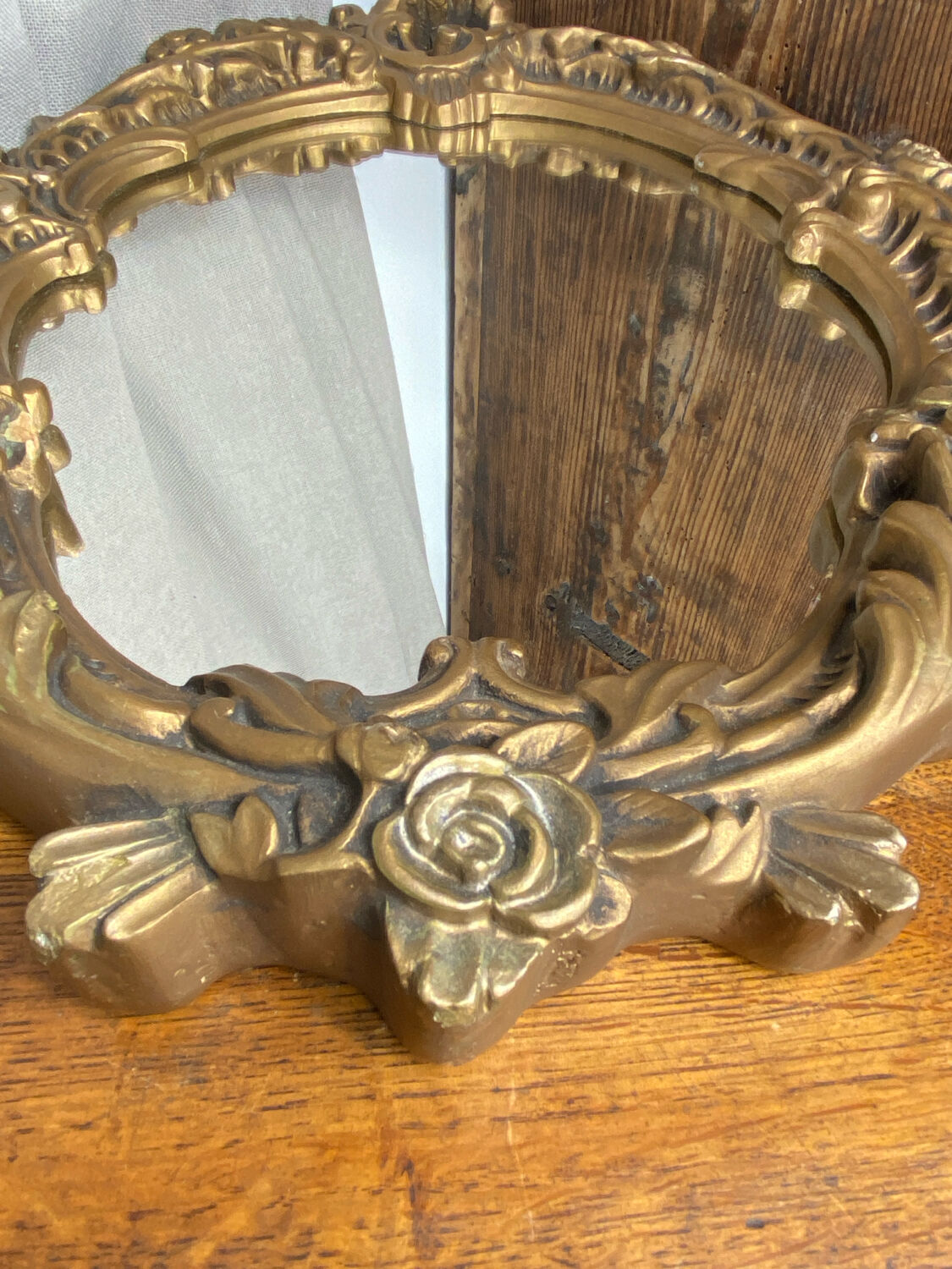Rococo style mirror in wood and gilded stucco