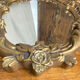 Rococo style mirror in wood and gilded stucco
