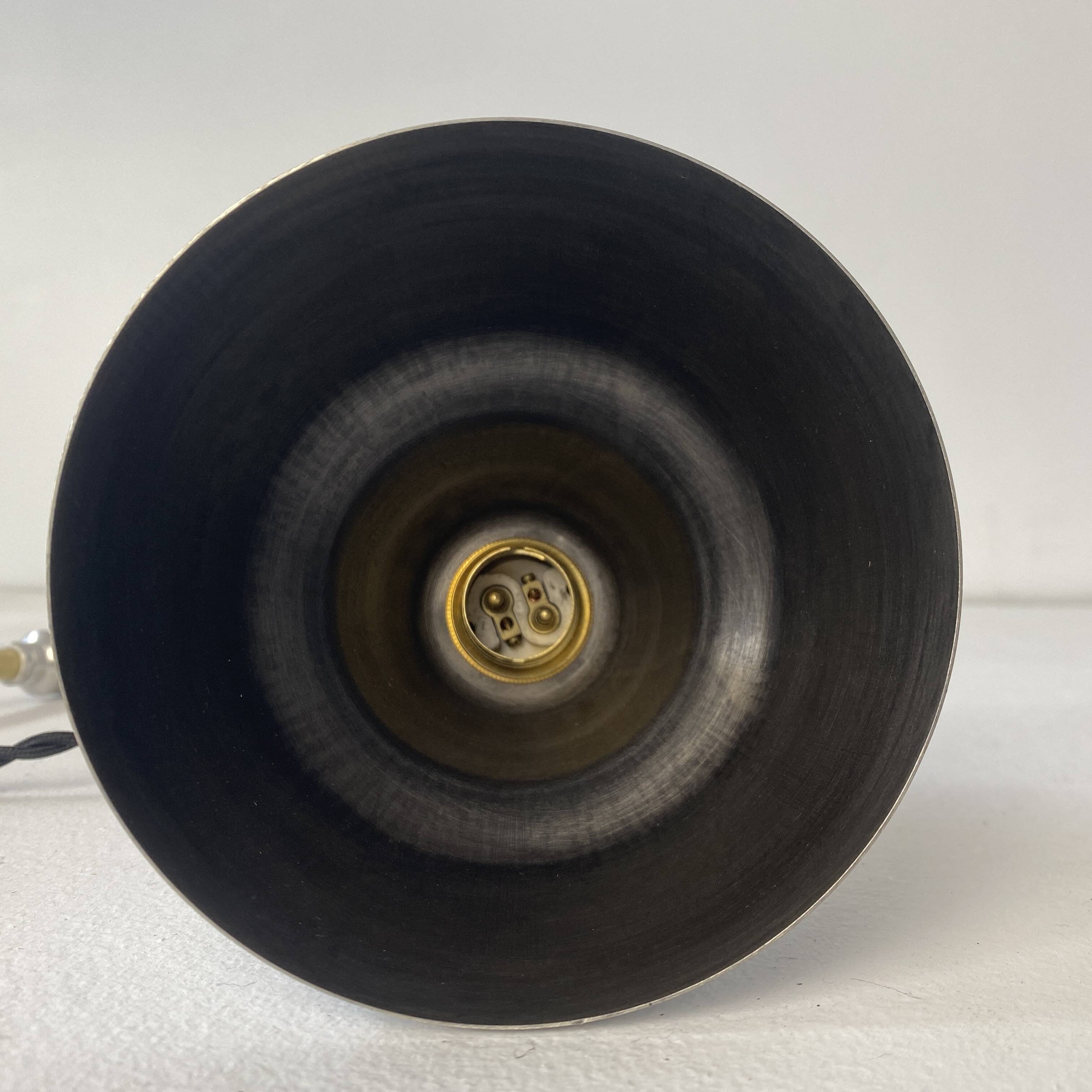 Old articulated industrial workshop lamp