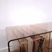 Vintage hifi, LP cabinet, TV unit made of tinted plexiglass on wheels, records.