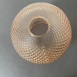 Spherical glass globe with pins. Salmon pink color