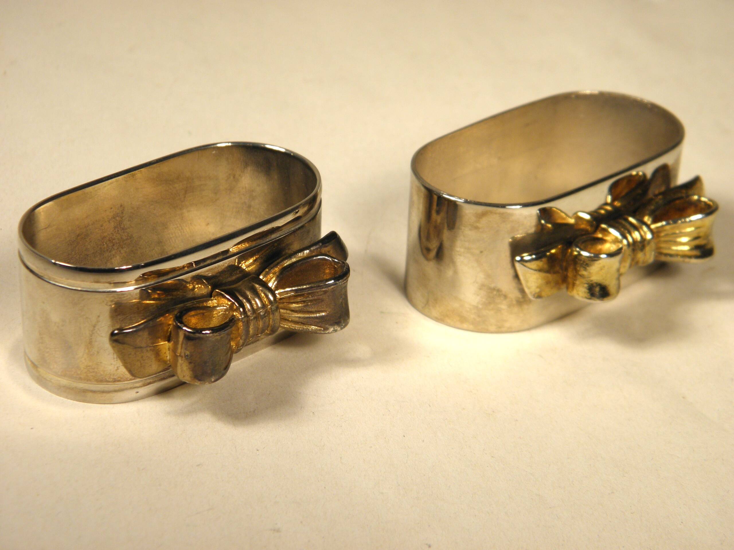 8 silver and gold napkin rings