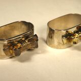 8 silver and gold napkin rings