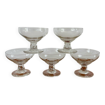 set of 5 crystal champagne glasses, worked and faceted feet, 1960