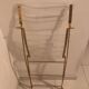Folding chair in plexiglass and brass